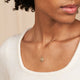 Model wearing the Stars in the Sky Three Diamond Necklace in 14k white gold.